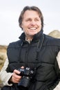 Happy smiling male photographer Royalty Free Stock Photo
