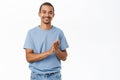 Happy smiling man applausing, clap hands to praise you, standing over white background Royalty Free Stock Photo