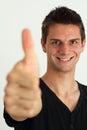 Happy smiling man doing two thumbs up Royalty Free Stock Photo