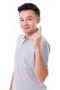 Happy, smiling man giving no.1 hand gesture Royalty Free Stock Photo