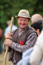 Happy man with a pitchfork at the Fete de la Moisson at Saint Denis de Gastines 2018