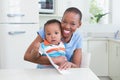 Happy smiling mother with his babyboy Royalty Free Stock Photo