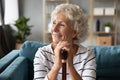 Happy smiling older woman holding hands on wooden cane Royalty Free Stock Photo