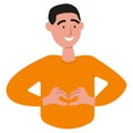 A happy smiling person gestures a heart sign with his hands. Approval, like man, love. Body language