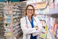 Happy smiling pharmacist in drugstore Royalty Free Stock Photo