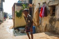 Happy smiling poor Indian boy from Banganga slum in Mumbai, India