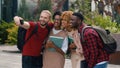 Happy smiling posing multiracial students diverse multiethnic friends university college campus outdoors after studying Royalty Free Stock Photo