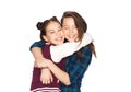 Happy smiling pretty teenage girls hugging Royalty Free Stock Photo