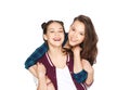 Happy smiling pretty teenage girls hugging Royalty Free Stock Photo