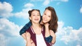 Happy smiling pretty teenage girls hugging Royalty Free Stock Photo