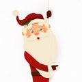 Happy smiling Santa Claus standing behind a blank sign, showing on big blank sign. Cartoon Santa Claus character with Royalty Free Stock Photo