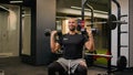 Happy smiling strong African American man lift dumbbells in gym sporty guy sport male fitness trainer instructor Royalty Free Stock Photo