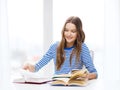 Happy smiling student girl with books Royalty Free Stock Photo
