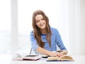 Happy smiling student girl with books Royalty Free Stock Photo