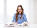 Happy smiling student girl with books Royalty Free Stock Photo