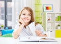 happy smiling student girl reading book at home Royalty Free Stock Photo