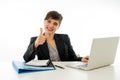 Portrait of happy attractive young businesswoman on laptop looking confident with thumb up Royalty Free Stock Photo