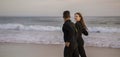 Happy Smiling Surfers Couple Running Together Along The Beach Royalty Free Stock Photo