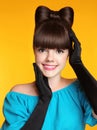 Happy smiling teen girl with bow hairstyle, beauty young model p Royalty Free Stock Photo