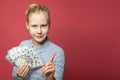 Happy smiling teen girl with money cash. Windfall, win-win and earnday concept Royalty Free Stock Photo