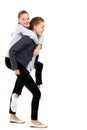 Happy Smiling Teen Girl Piggy Backing her Twin Sister