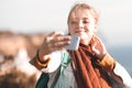 Happy smiling teen girl 14-16 year old make selfie over sea background close up Royalty Free Stock Photo