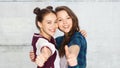 Happy smiling teenage girls showing thumbs up Royalty Free Stock Photo