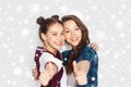 Happy smiling teenage girls showing thumbs up Royalty Free Stock Photo