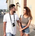 Happy smiling tourists walking and enjoying the view Royalty Free Stock Photo