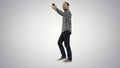 Happy smiling walking handsome bearded young man making selfie o Royalty Free Stock Photo