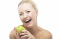 Happy Smiling Woman Dieting with Green Apple. Healthy Lifestyle, Nutritious and Organic Food Concepts Royalty Free Stock Photo