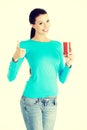 Happy smiling woman drinking tomato juice Royalty Free Stock Photo