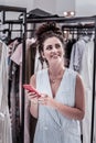 Happy smiling woman feeling amazing while shopping having some free time