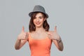 Happy smiling woman giving thumbs up gesture Royalty Free Stock Photo