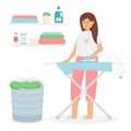 Happy smiling woman ironing clothes Royalty Free Stock Photo