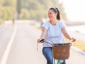 Happy smiling woman riding bicycle Royalty Free Stock Photo