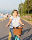 Happy smiling woman riding bicycle Royalty Free Stock Photo