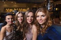 Happy smiling women taking selfie at night club Royalty Free Stock Photo