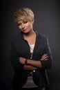 Happy smiling young blond woman with short bob hair style and tr Royalty Free Stock Photo