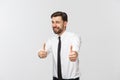 Happy smiling young business man with thumbs up gesture, isolated over white background