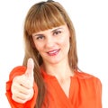 Happy smiling young business woman showing thumbs up gesture, is Royalty Free Stock Photo