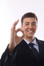 Happy smiling young businessman with okay gesture, Royalty Free Stock Photo