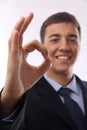 Happy smiling young businessman with okay gesture, Royalty Free Stock Photo