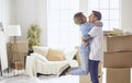 Happy smiling young couple showing a pair of keys of their new house Royalty Free Stock Photo