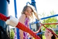 Happy smiling young girl in playground Royalty Free Stock Photo