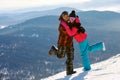 Happy snowboarding couple