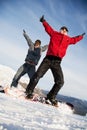 Happy snowboarding team Royalty Free Stock Photo