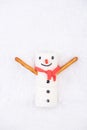 Happy Snowman in Snow. Marshmalow Sweet Festive Food Royalty Free Stock Photo