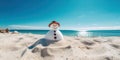 Happy snowman sunbathing at the sand beach