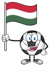 Happy Soccer Ball Cartoon Mascot Character Holding A Flag Of Hungary Royalty Free Stock Photo